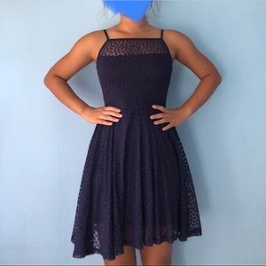 dark blue polka dot mini dress